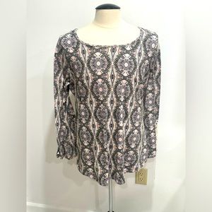 Long sleeve printed top with crochet detail and criss cross back!